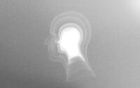 Silhouette of a head with layered outlines.